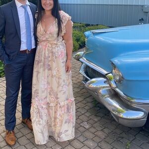 Floral Maxi Dress with Ruffle Sleeves and open tied back